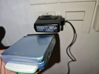 Game Boy Advance SP cargador y juego