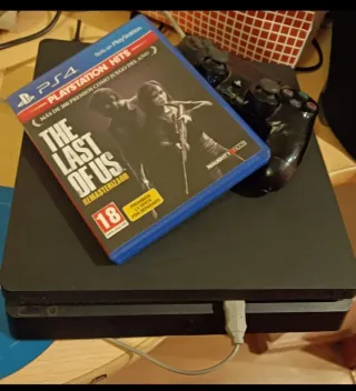PS4  más un juego The Last of Us Remasterizado Jue