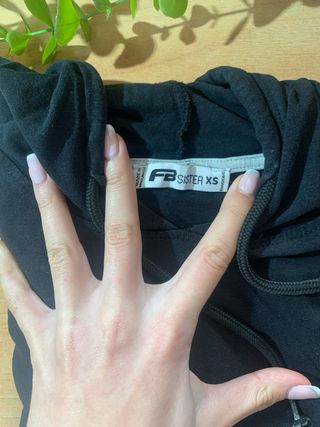 Top corto con capucha Nike negro XS