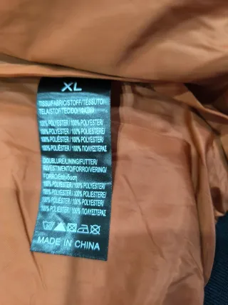 Cazadora universitaria chico azul y naranja