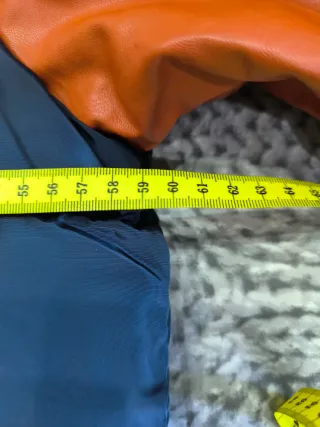 Cazadora universitaria chico azul y naranja