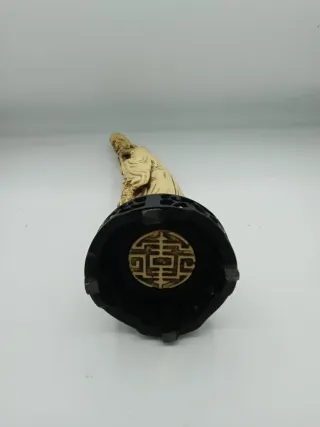 Statua orientale in resina con bambino