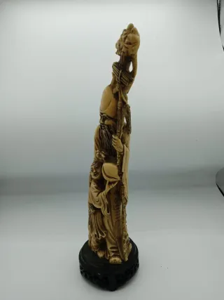 Statua orientale in resina con bambino