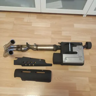 Sistema de escape moto