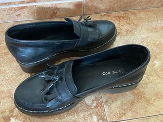 Mocasines negros con borlas