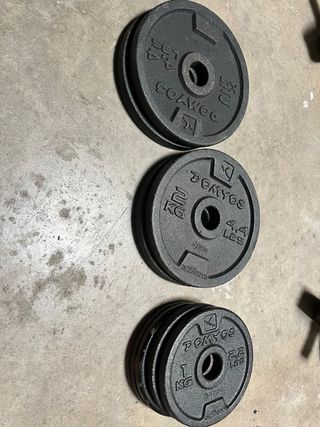 Juego de pesas y barra