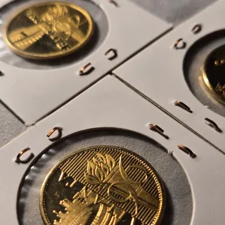 LOTE 9 -  3 Monedas conmemorativas - Olimpiadas