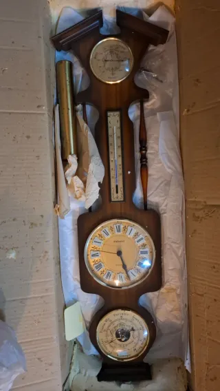 Reloj de pared madera y latón