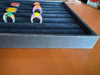 Lote expositor negro + 10 anillos