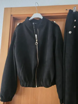 Conjunto negro chaqueta y pantalón