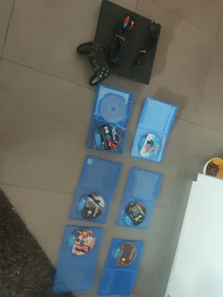 PS4 Negra + Pack 6 Juegos PS4 + DualShock4