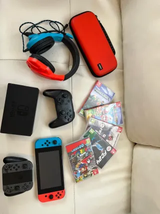 Pacchetto Nintendo Switch + Controller Pro + Giochi