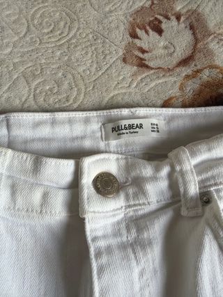 Pantalones blancos flare