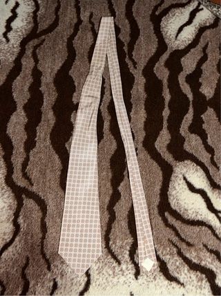 Corbata beige con estampado floral