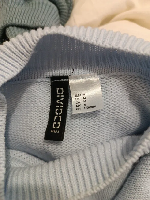 Jersey azul cielo cuello alto