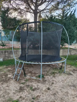 Cama elástica con red de seguridad