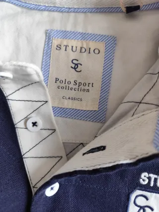 Polo / niki STUDIO manga larga azul. Corte Inglés.