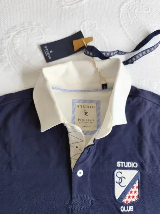 Polo / niki STUDIO manga larga azul. Corte Inglés.