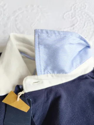 Polo / niki STUDIO manga larga azul. Corte Inglés.