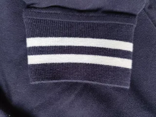 Polo / niki STUDIO manga larga azul. Corte Inglés.