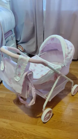 Carrito de bebé para muñecas rosa