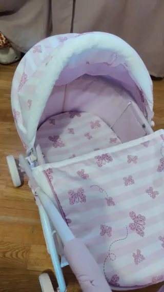 Carrito de bebé para muñecas rosa