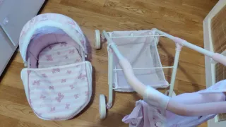 Carrito de bebé para muñecas rosa