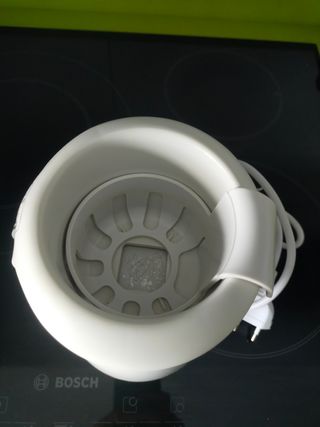 Calienta biberones marca Chicco. Enchufe para coch