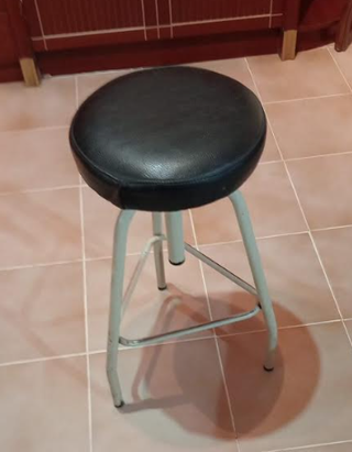 Taburete giratorio piel y hierro