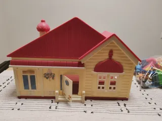 Casa Bluey con familia y accesorios
