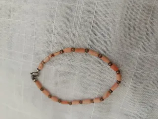 Bracciale corallo rossastro chiusura acciaio