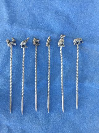 Pinchos de mesa antiguos