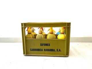 Sifón antiguo amarillo