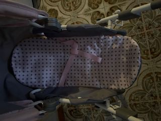 Cochecito de juguete para muñecas