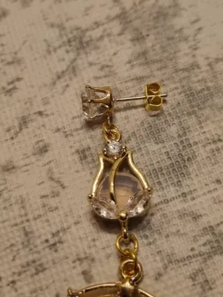 Orecchini pendenti dorati con stella