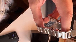 Reloj Calvin Klein plateado y blanco