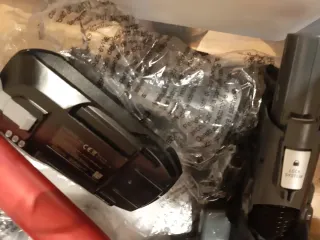 Aspirador escoba con accesorios Rowenta.