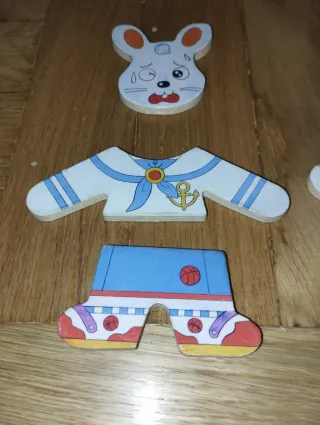 Juego puzzle madera conejos y ropa