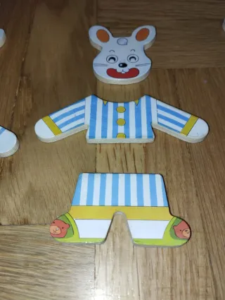 Juego puzzle madera conejos y ropa