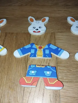 Juego puzzle madera conejos y ropa