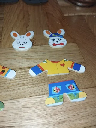 Juego puzzle madera conejos y ropa