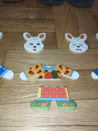 Juego puzzle madera conejos y ropa