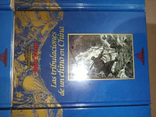 6 libros de Julio Verne sin abrir. Con su embalaje