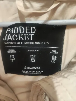 Plumífero beige acolchado