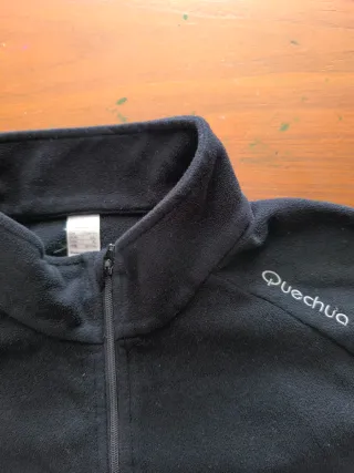 Forro polar negro con cremallera