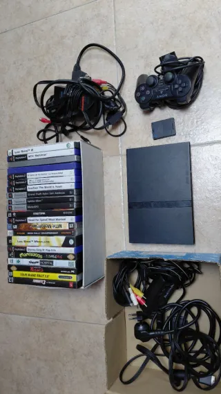 PS2 Slim Negra + Mando + Caja con Juegos