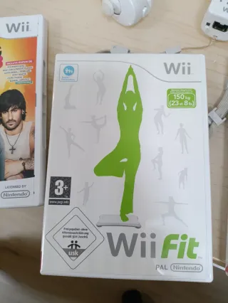Consola Wii + 2 mandos + 4 juegos