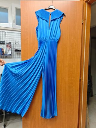 Tuta elegante blu con pantaloni plissettati