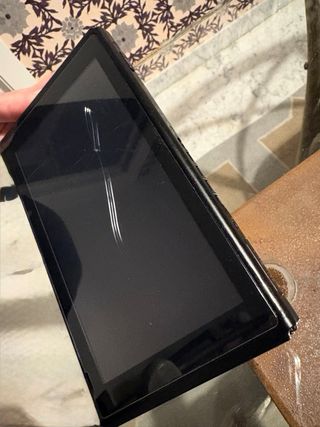 Nintendo Switch con 6 juegos, funda y mando pro