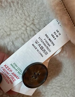 Abrigo efecto piel doble faz New Look